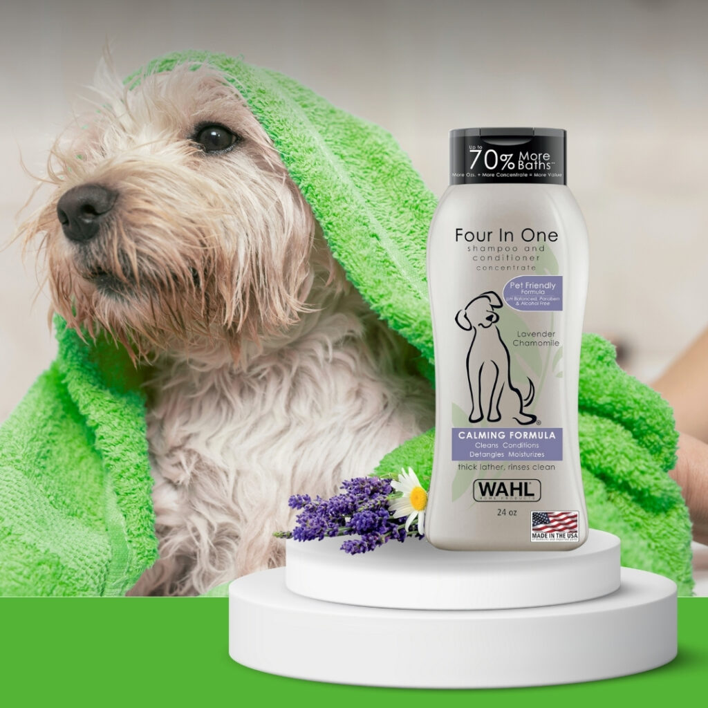 Wahl Lavender Chamomile dog shampoo next to a dog with sensitive skin enjoying bath time | HappyBarker